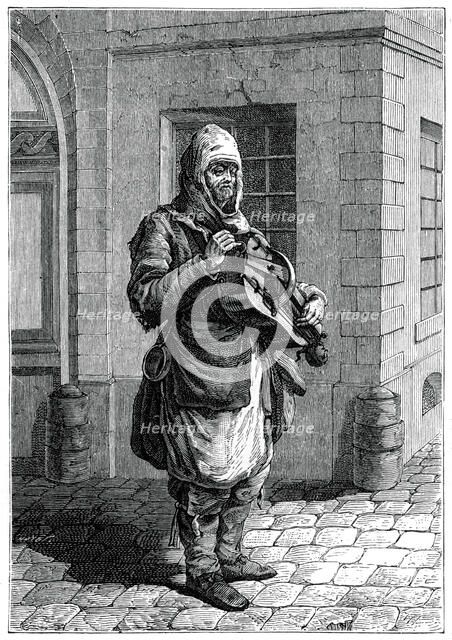 Travelling Musician, (1885).Artist: Francois-Robert Ingouf