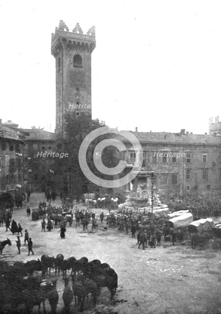 ''Trente Italienne; Cantonnement de cavalerie italienne devant la vicille tour de l'Horloge', 1918. Creator: Unknown.