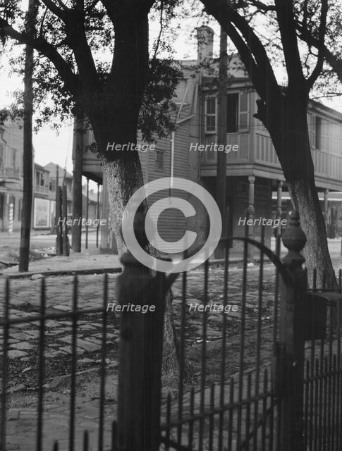 Triangular Bar, Magazine Street, New Orleans, between 1920 and 1926. Creator: Arnold Genthe.