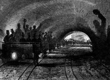 Trial-trip on the Metropolitan (underground) Railway: the train passing Portland-road station, 1862. Creator: Unknown