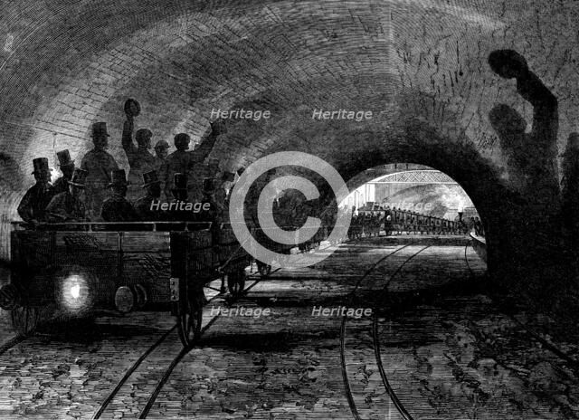 Trial-trip on the Metropolitan (underground) Railway: the train passing Portland-road station, 1862. Creator: Unknown.