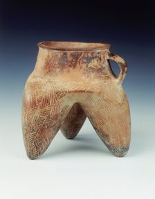 Tripod jar with strap handle and hollow legs, Qijia culture, Qinghai province, China, 1800-1500 BC. Creator: Unknown
