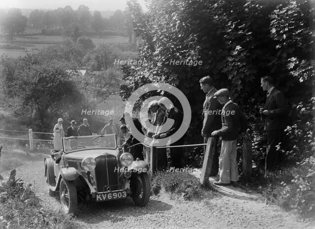 Triumph 2-seater taking part in a West Hants Light Car Club Trial, Ibberton Hill, Dorset, 1930s. Artist: Bill Brunell.