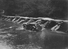 Triumph competing in the Mid Surrey AC Barnstaple Trial, Tarr Steps, Exmoor, Somerset, 1934. Artist: Bill Brunell