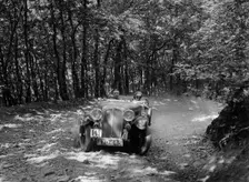 Triumph competing in the B&HMC Brighton-Beer Trial, Fingle Bridge Hill, Devon, 1934. Artist: Bill Brunell