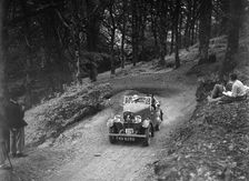 Triumph open tourer taking part in the B&HMC Brighton-Beer Trial, Fingle Bridge Hill, Devon, 1934. Artist: Bill Brunell