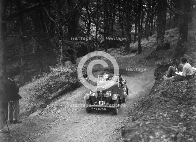 Triumph open tourer taking part in the B&HMC Brighton-Beer Trial, Fingle Bridge Hill, Devon, 1934. Artist: Bill Brunell.