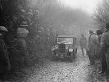 Triumph saloon of CH Lawford competing in the MCC Exeter Trial, 1930. Artist: Bill Brunell