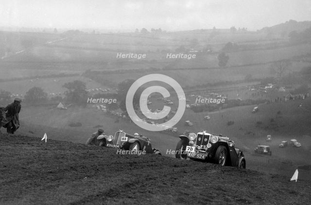Triumph Southern Cross and MG Magnette at the MG Car Club Rushmere Hillclimb, Shropshire, 1935. Artist: Bill Brunell.