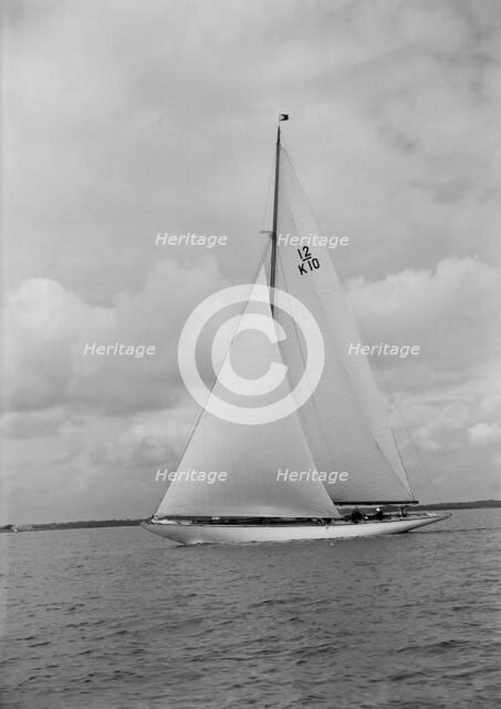 'Trivia', a 12 Metre class yacht sails close-hauled, 1939. Creator: Kirk & Sons of Cowes.