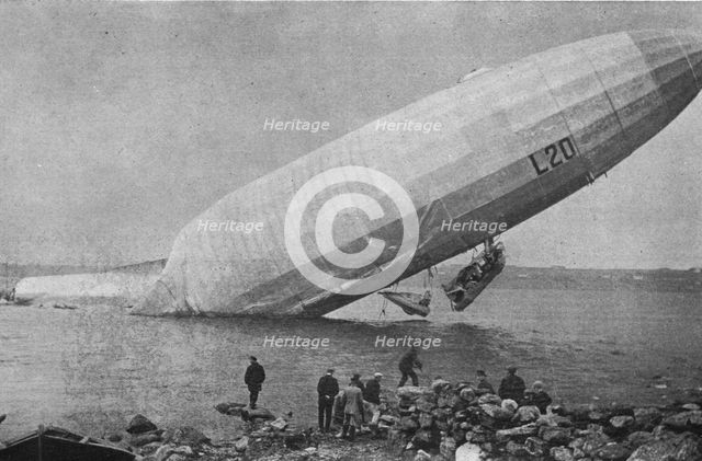 'Trois Zeppelins detruits en trois jours. Le "L20" dans un fjord de Norvege; En derivant..., 1916. Creator: Unknown.