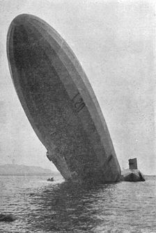 Trois Zeppelins detruits en trois jours. Le "L20" dans un fjord de Norvege; L'avant dresse..., 1916 Creator: Unknown