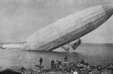 Trois Zeppelins detruits en trois jours. Le "L20" dans un fjord de Norvege; En derivant..., 1916. Creator: Unknown