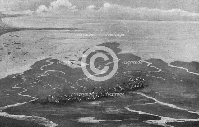'Trois Zeppelins detruits en trois jours. Le "LZ85" a l'embouchure du Vardar..., 1916. Creator: Unknown.