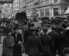 Troops from the USA or Commonwealth Walking Through London, 1943. Creator: British Pathe Ltd