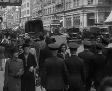 Troops from the USA or Commonwealth Walking Through London, 1943. Creator: British Pathe Ltd