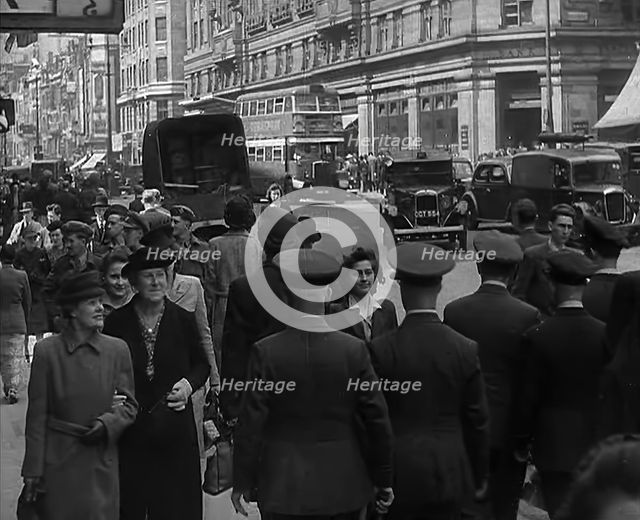 Troops from the USA or  Commonwealth Walking Through London, 1943. Creator: British Pathe Ltd.