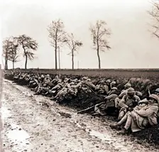Troops resting by the side of a road, northern France, c1914-c1918