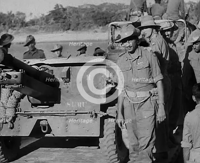 Troops Standing by an Artillery Gun on ‘Grub Bridge’, 1943. Creator: British Pathe Ltd.