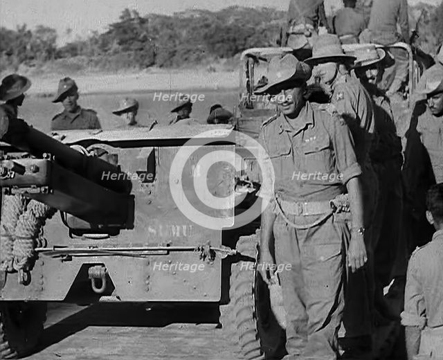 Troops Standing by an Artillery Gun on ‘Grub Bridge’, 1943. Creator: British Pathe Ltd.
