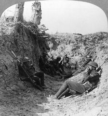 Troops waiting in a trench near Arras, France, World War I, c1914-c1918. Artist: Realistic Travels Publishers