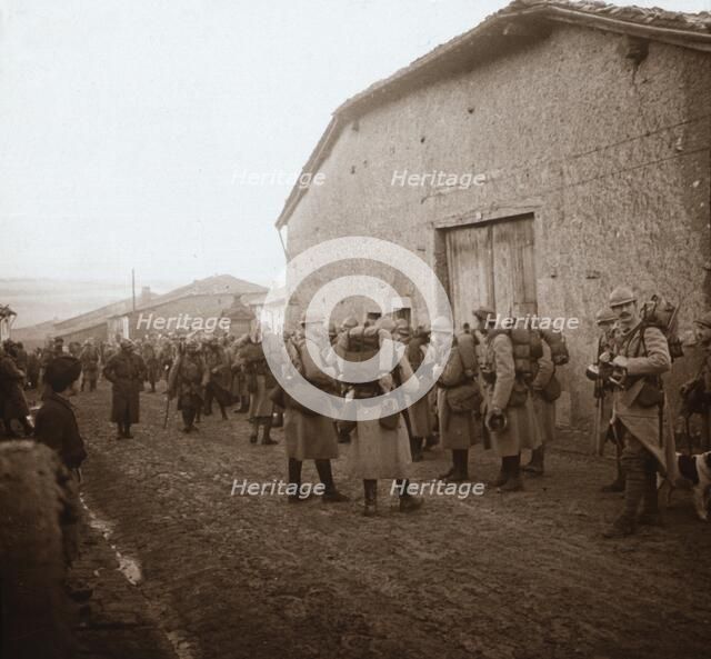 Troops with packs on backs, Somme, northern France, c1914-c1918. Artist: Unknown.