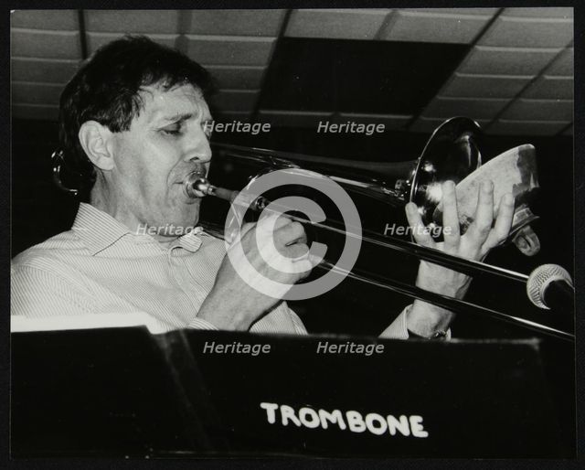 Trombonist Derek Wadsworth playing at The Fairway, Welwyn Garden City, Hertfordshire, 28 July 1991. Artist: Denis Williams