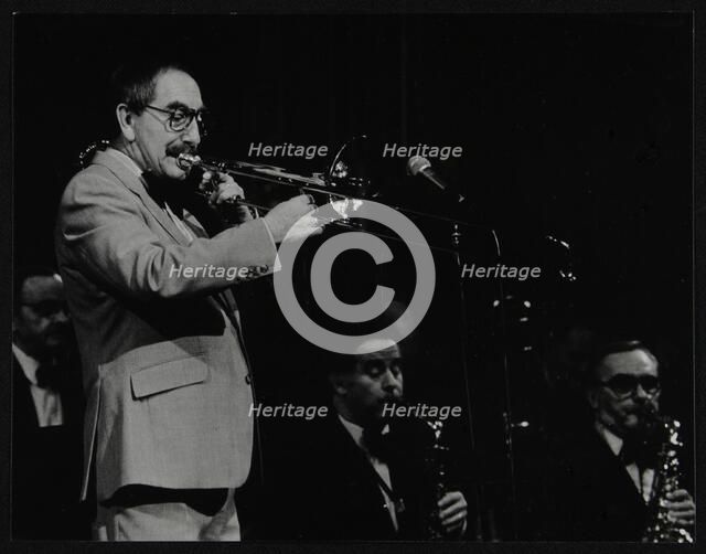 Trombonist Don Lusher playing with the Ted Heath Orchestra. Artist: Denis Williams