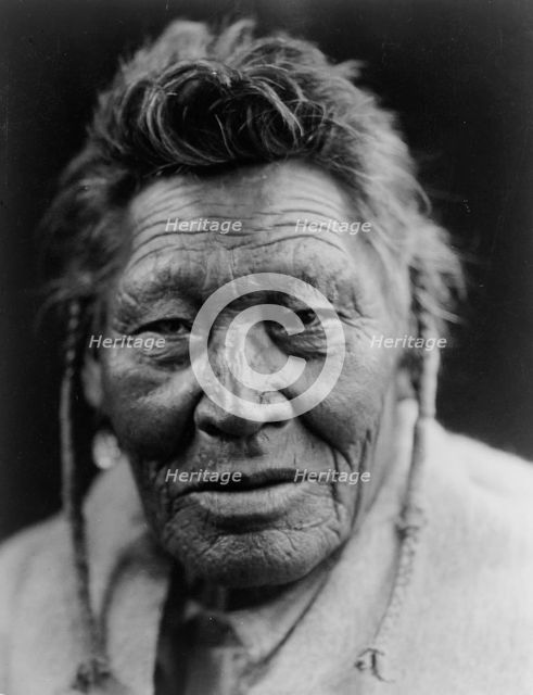 Tsaassi-Mis-salla ("Crow with Necklace")-Sarsi, c1927. Creator: Edward Sheriff Curtis.