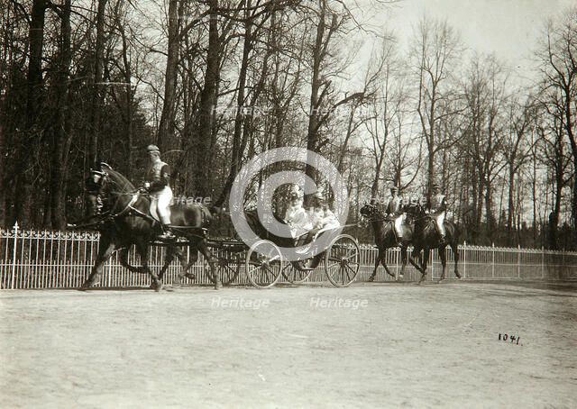 Tsar Nicholas II and Tsarina Alexandra Fyodorovna of Russia in a carriage, early 20th century. Artist: K von Hahn