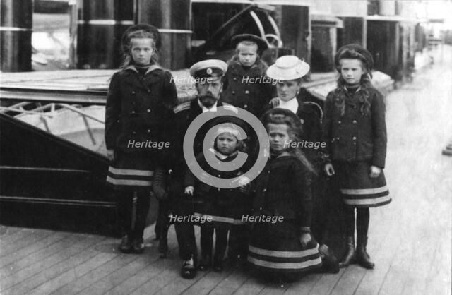 Tsar Nicholas II and Tsarina Alexandra of Russia and their children, 1907.  Artist: Unknown.