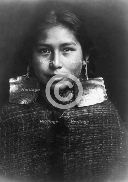 Tsawatenok girl, head-and-shoulders portrait, facing front, c1914. Creator: Edward Sheriff Curtis.