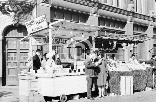 Tubby Isaacs' stall, Middlesex Street, Aldgate, London, (1960s?). Artist: Unknown