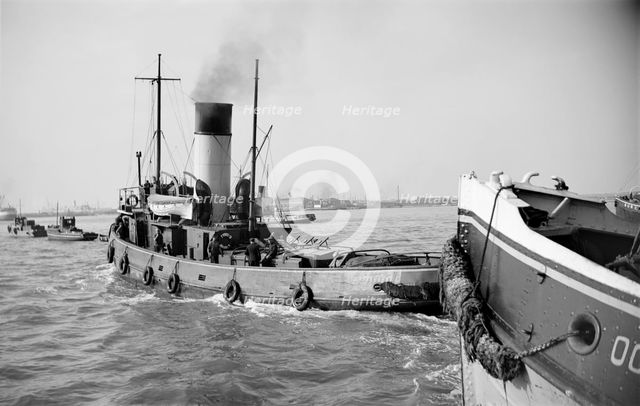 Tugs leaving the Royal Terrace Pier at Gravesend, Kent, c1945-c1965.  Artist: SW Rawlings