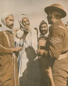 Tunisian Arabs Welcome a British Sergeant at Chaouach 1943