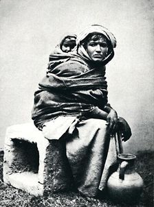 Tunisian (Berber) woman and child, 1912. Artist: J Garrigues