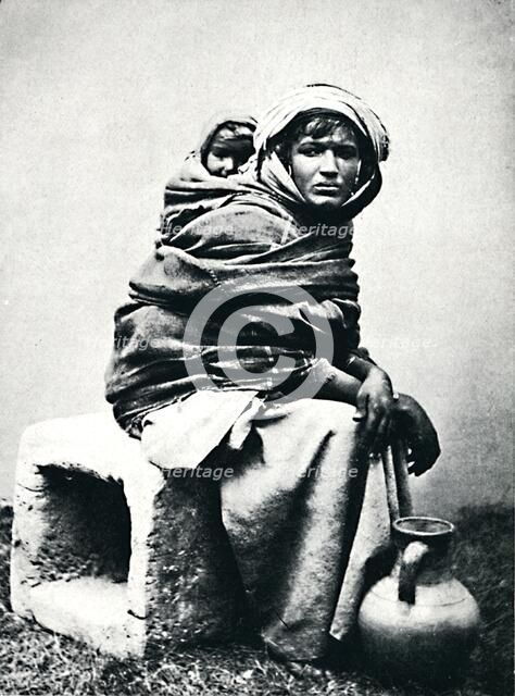 Tunisian (Berber) woman and child, 1912. Artist: J Garrigues.