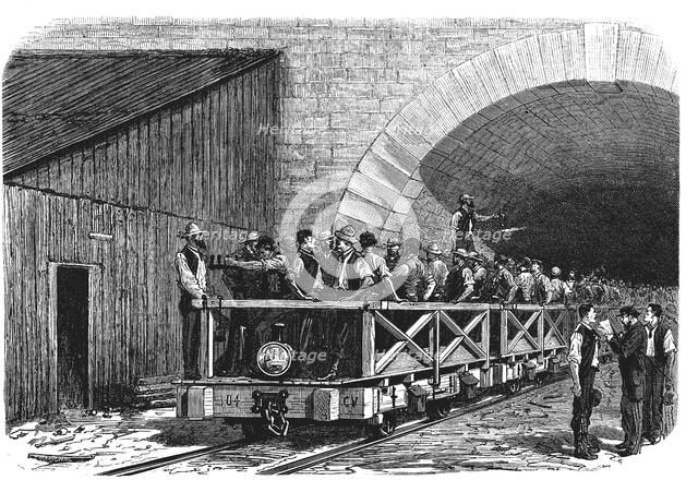 Tunnel opening of the Alps, workers exiting after a working day by the French mouth of Mont - Cen…