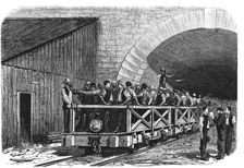 Tunnel opening of the Alps, workers exiting after a working day by the French mouth of Mont - Cen…