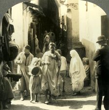 Turbaned Men and Veiled Women Crowd this Narrow Street in the Arab Quarter of Algiers Algeria c19 Creator: Unknown