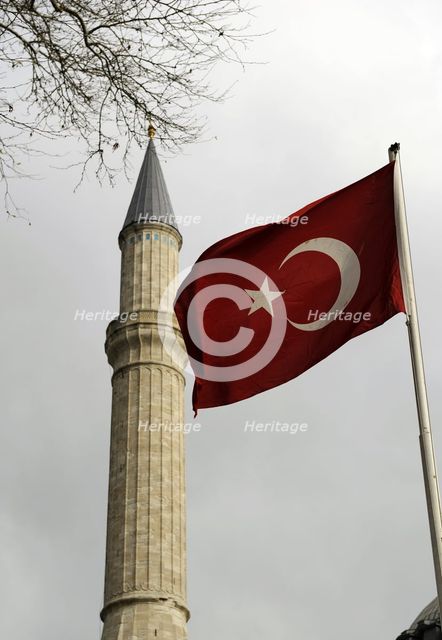Turkish flag and minaret of Hagia Sophia, Istanbul, Turkey, 2013. Creator: LTL.