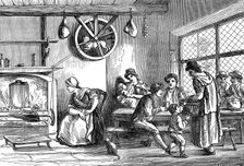 Turnspit dog at work in the inn at Newcastle, Carmarthen, Wales, c1800 (1869)