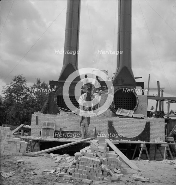 Turpentine plant near Marianna, Florida, 1937. Creator: Dorothea Lange.
