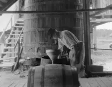 Turpentine "stiller" near Valdosta, Georgia, 1937. Creator: Dorothea Lange