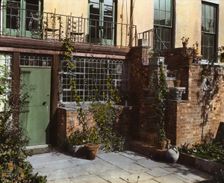 Turtle Bay Gardens, 227-247 East 48 Street and 228-246 East 49th Street, New York, New York, 1920. Creator: Frances Benjamin Johnston