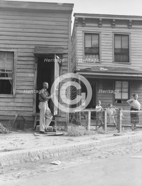 Twelve dollars a month for three rooms, Housing, Richmond, Virginia. , 1938. Creator: Dorothea Lange.