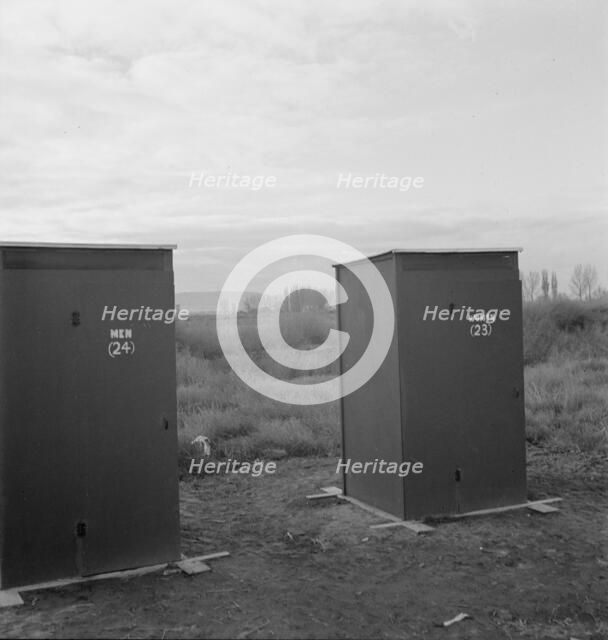 Twenty-four portable toilets, mobile camp (FSA), equipment, Merrill, Klamath County, Oregon, 1939. Creator: Dorothea Lange.