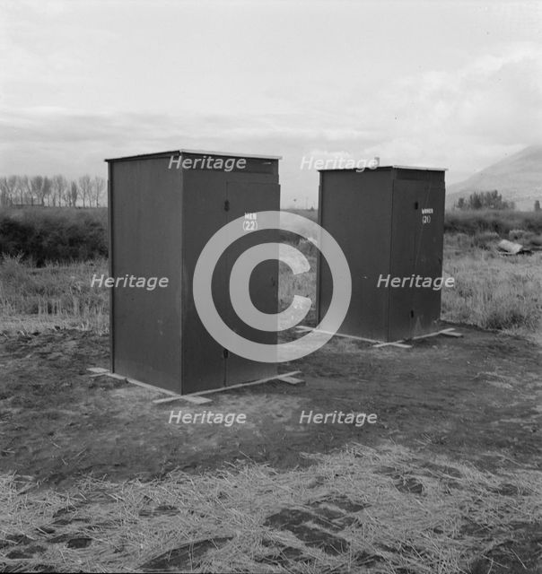 Twenty-four portable toilets, mobile camp (FSA)..., Merrill, Klamath County, Oregon, 1939. Creator: Dorothea Lange.