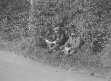 Two men taking a rest during the Bugatti Owners Club car treasure hunt, 25 October 1931. Artist: Bill Brunell