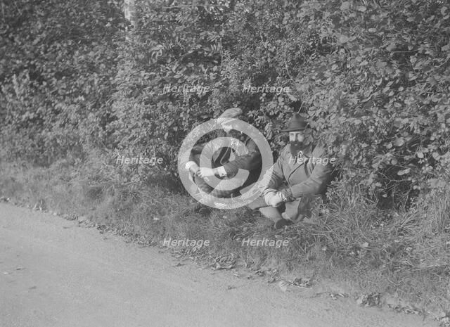 Two men taking a rest during the Bugatti Owners Club car treasure hunt, 25 October 1931. Artist: Bill Brunell.